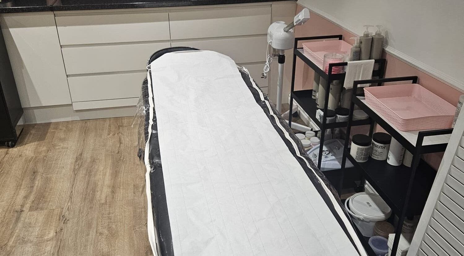 Calming treatment room at Precious Beauty in Hull, England, GB, ready for a relaxing wellness experience.