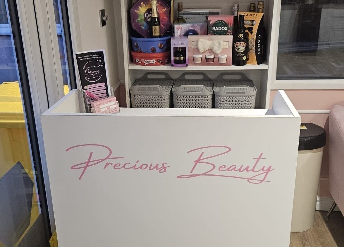 Chic reception area at Precious Beauty in Hull, England, GB, showcasing sleek design and welcoming atmosphere.