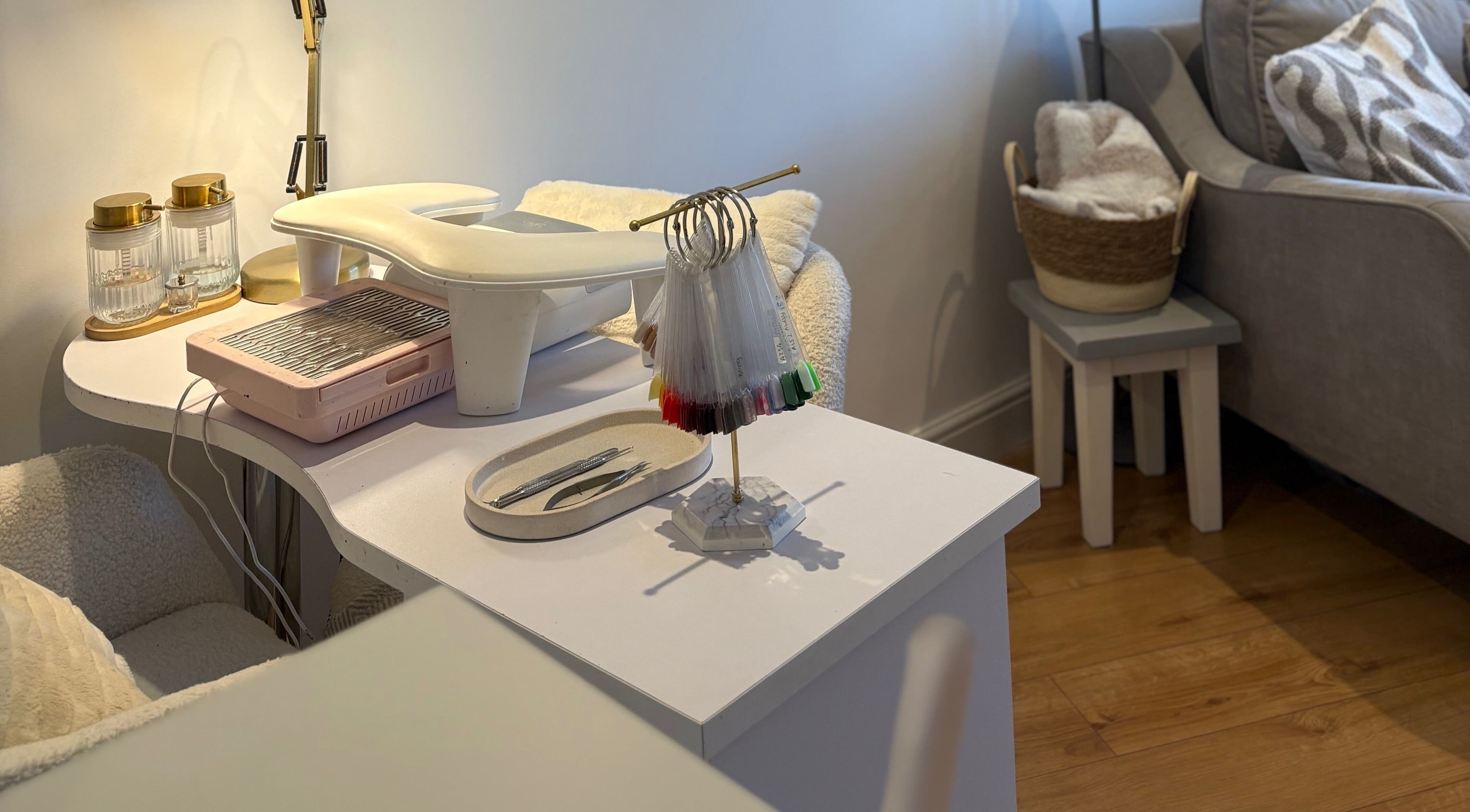 Elegant nail station at LParis Beauty, Earl Shilton, England, GB with tools and polish samples.