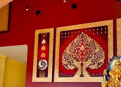 Elegant interior decor featuring golden artwork at Nakhon Thai Massage, Auckland, Auckland, NZ.
