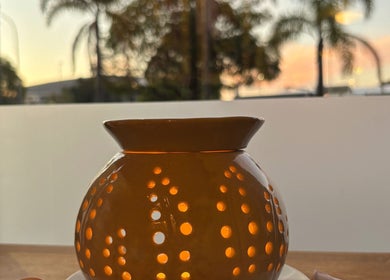 Warm glow of a candle holder at Nakhon Thai Massage, creating a tranquil ambiance in Auckland, Auckland, NZ.