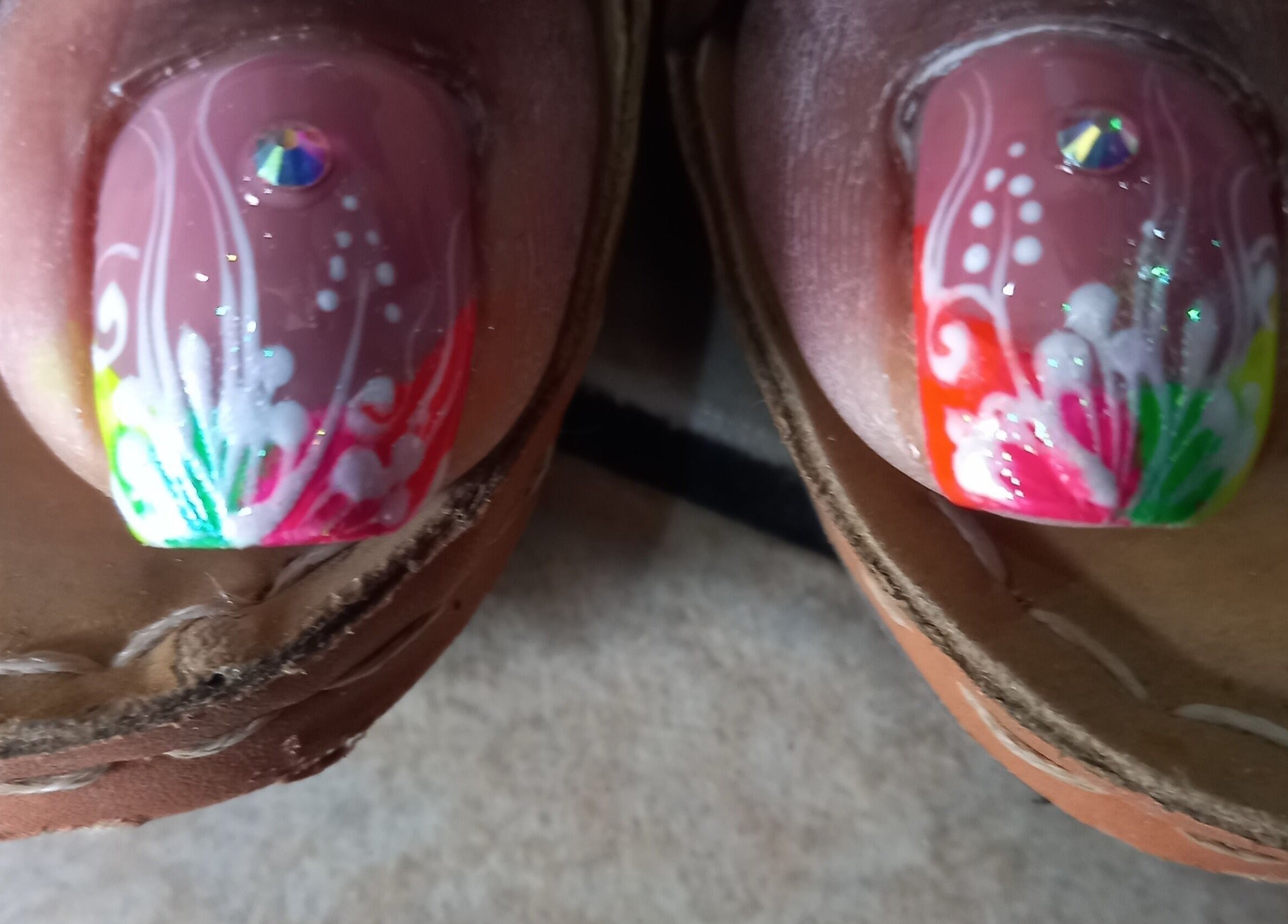 Bright floral nail design at Nailz Dezurve Jody, Siparia, TT. Colorful art perfect for a unique style.