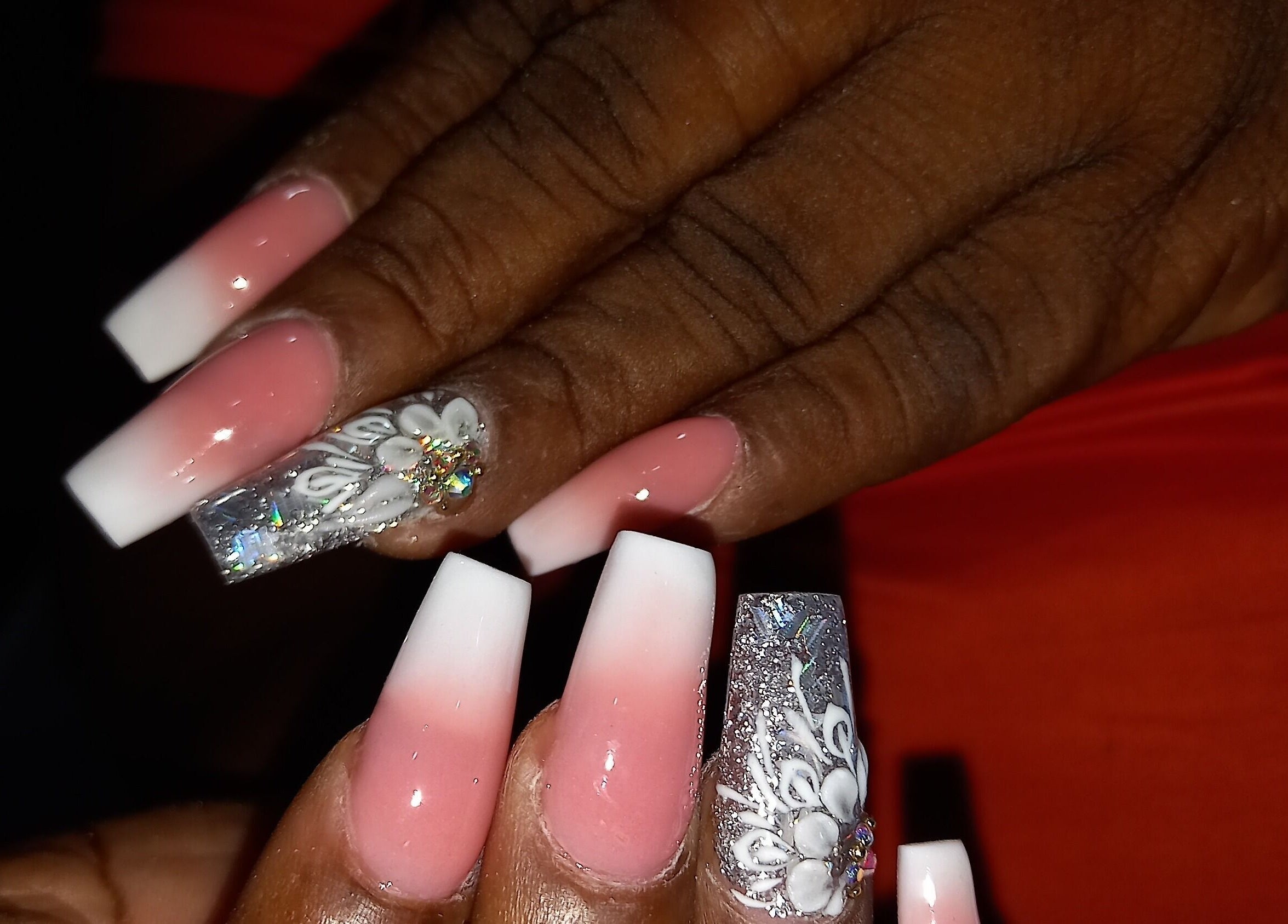 Stylish ombre nails with floral designs at Nailz Dezurve Jody, Siparia, Siparia, TT.