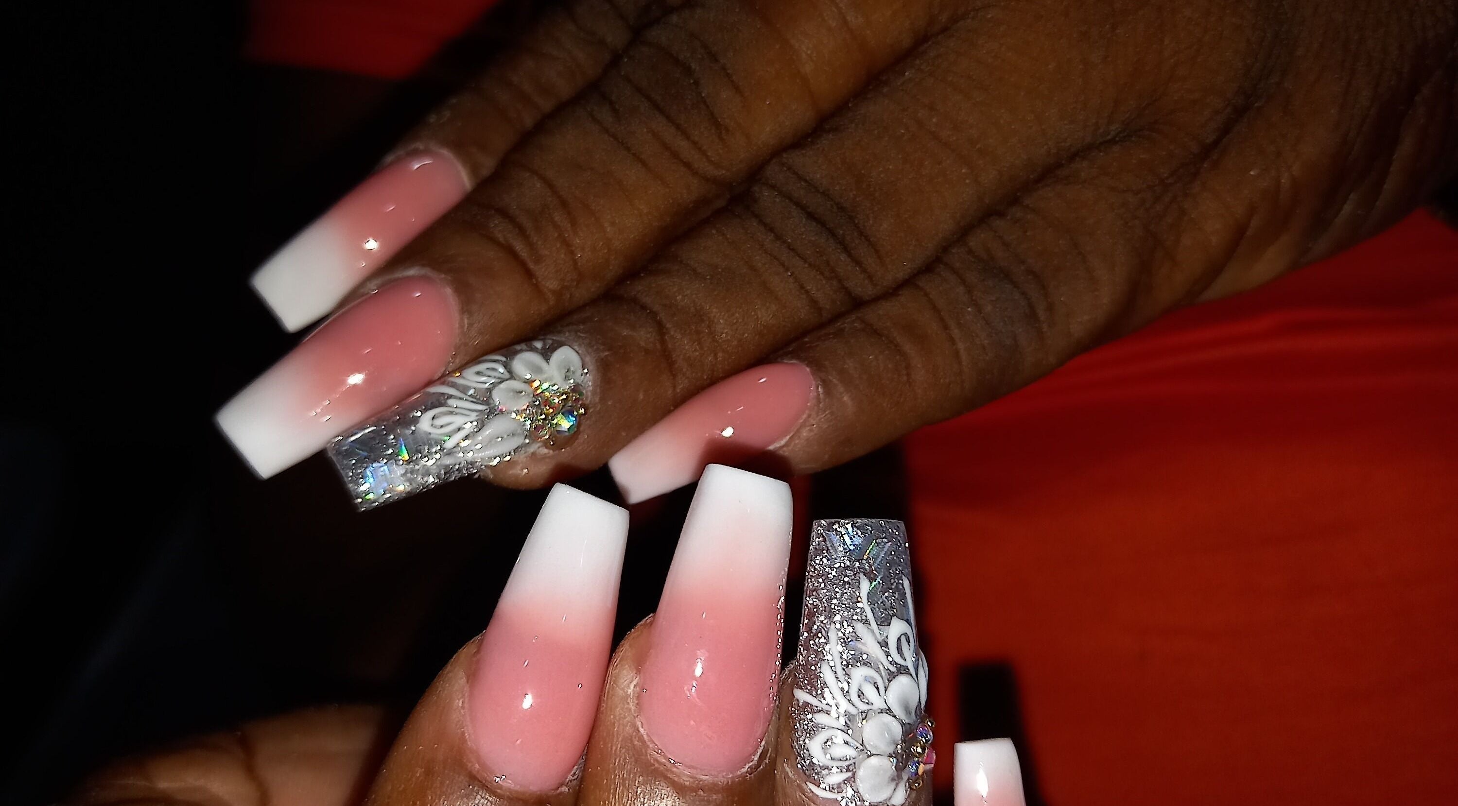 Stylish ombre nails with floral designs at Nailz Dezurve Jody, Siparia, Siparia, TT.