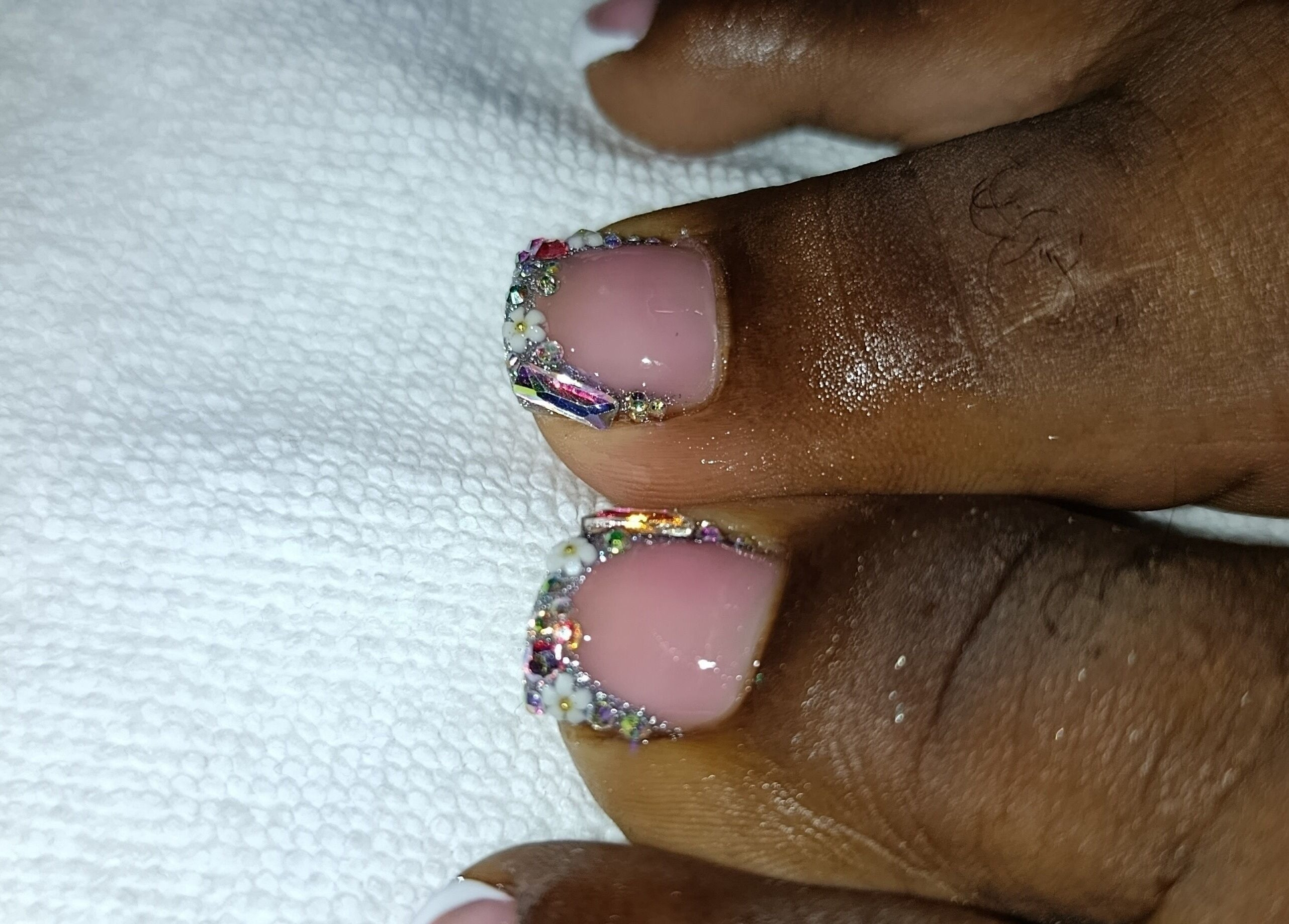 Elegant toe nail art at Nailz Dezurve Jody, Siparia, Siparia, TT showcasing intricate design and sparkle.