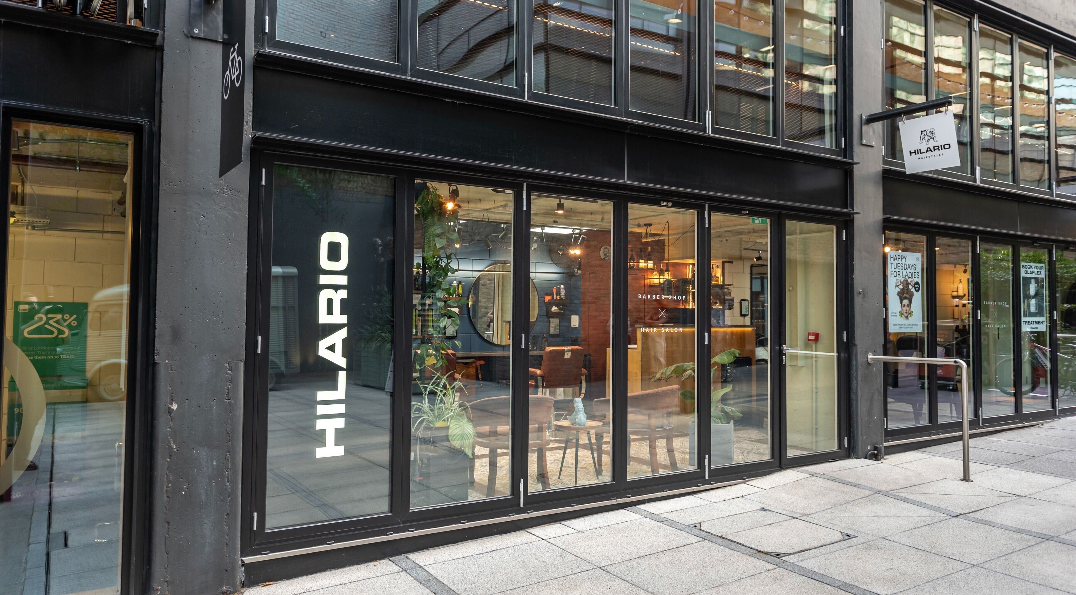 Exterior view of Hilario beauty and wellness venue in London, England, GB showcasing modern glass doors.