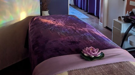 Tranquil massage room at Mud and Lotus Skincare in Burnsville, North Carolina, US, featuring calming decor.