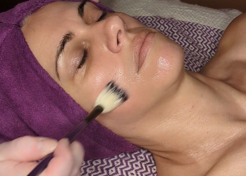 Facial treatment at Mud and Lotus Skincare in Burnsville, North Carolina, US, enhancing skin's radiance.