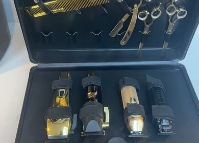 Professional barber tools at Tunechi the Barber, Coventry, England, GB. Premium clippers and scissors displayed.