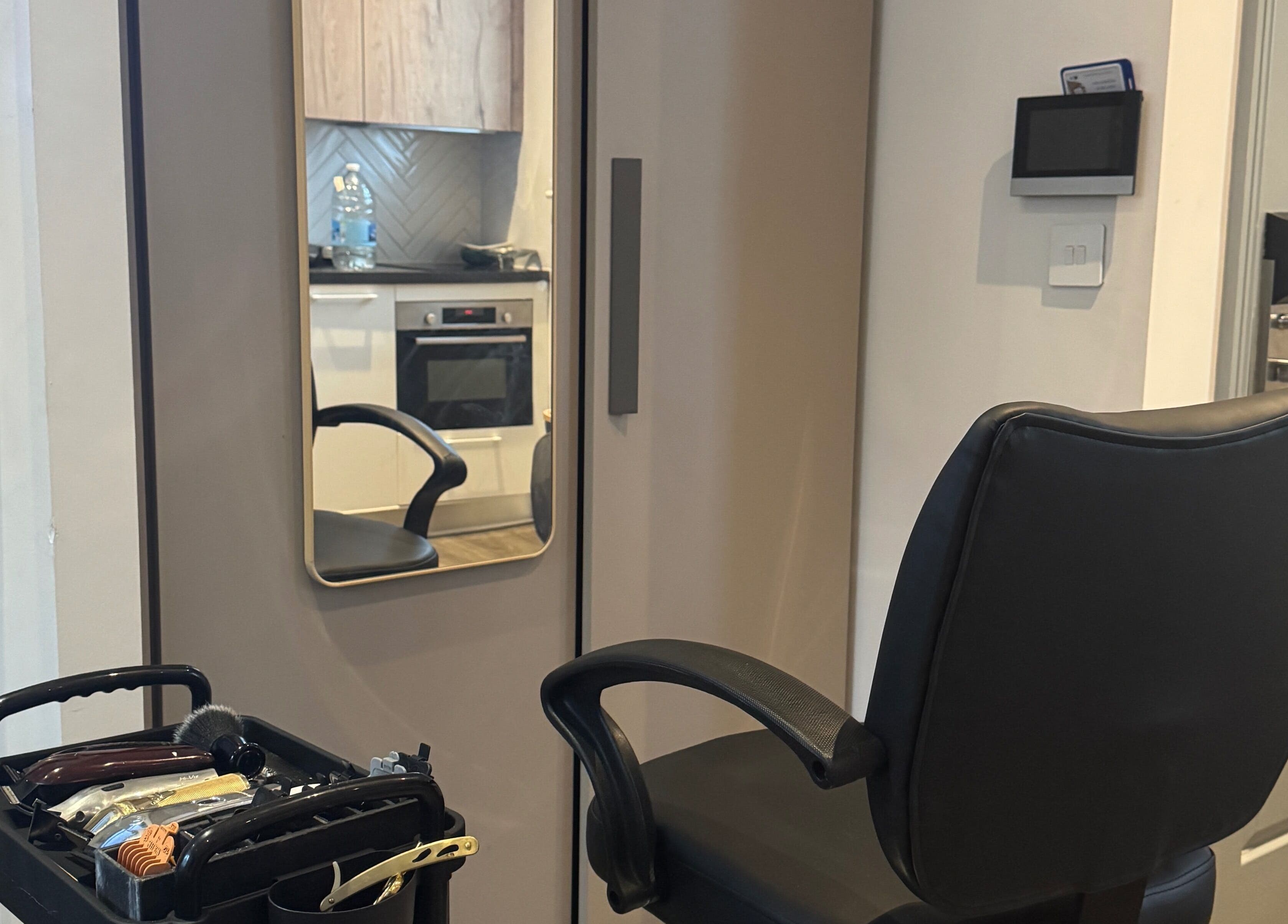 Modern barber chair and tools at Tunechi the Barber in Coventry, England, GB.