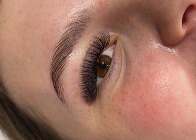 Close-up of expertly applied eyelash extensions at Lashedbykirax, Deal, England, GB, showcasing beauty craftsmanship.