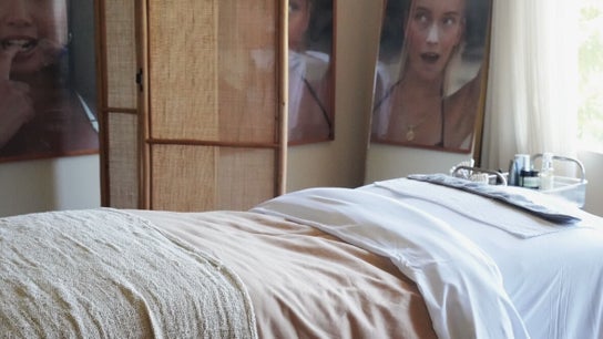 Relaxing spa treatment room at Salty Face Bali in Uluwatu, Bali, ID with cozy decor.
