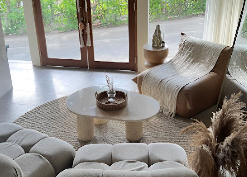 Inviting lounge area at Salty Face Bali, Uluwatu, Bali, ID, with plush seating and a stylish coffee table.