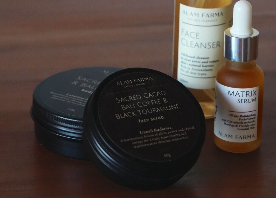 Luxurious skincare products at Salty Face Bali, Uluwatu, featuring face cleanser and serum for radiant skin.