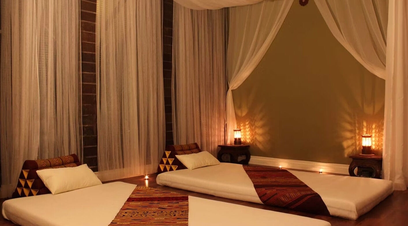 Cozy massage room at Thai Aromatherapy Massage, Wareemba, New South Wales, AU with soft lighting and elegant decor.
