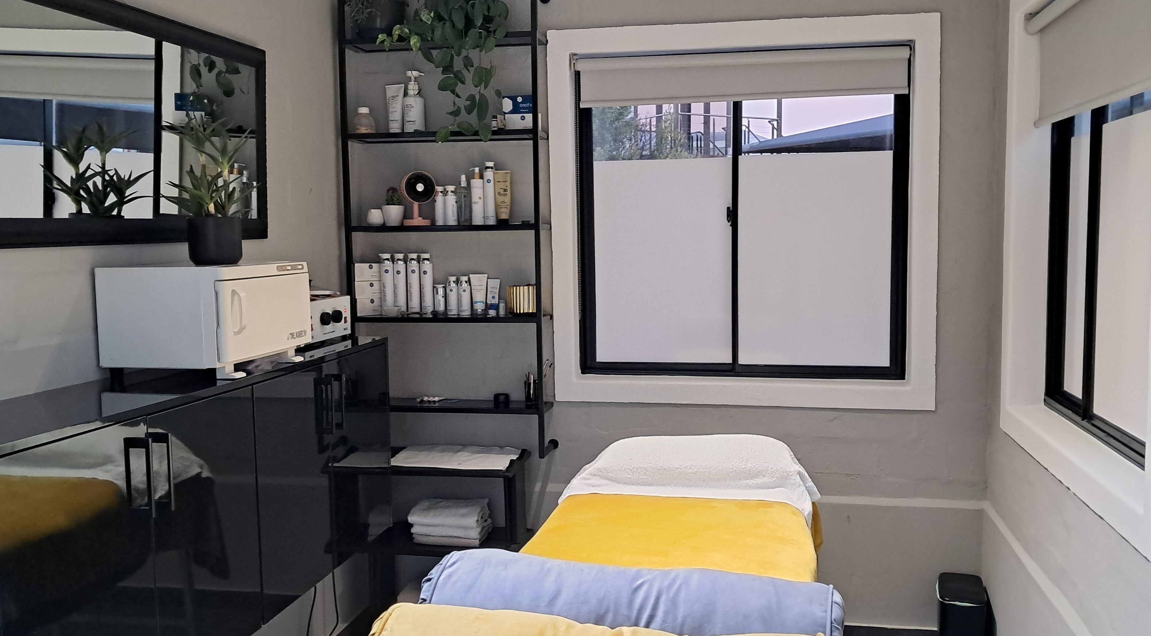 Chontell at Dames en Here spa room with cozy bed in Stellenbosch, Western Cape, ZA.