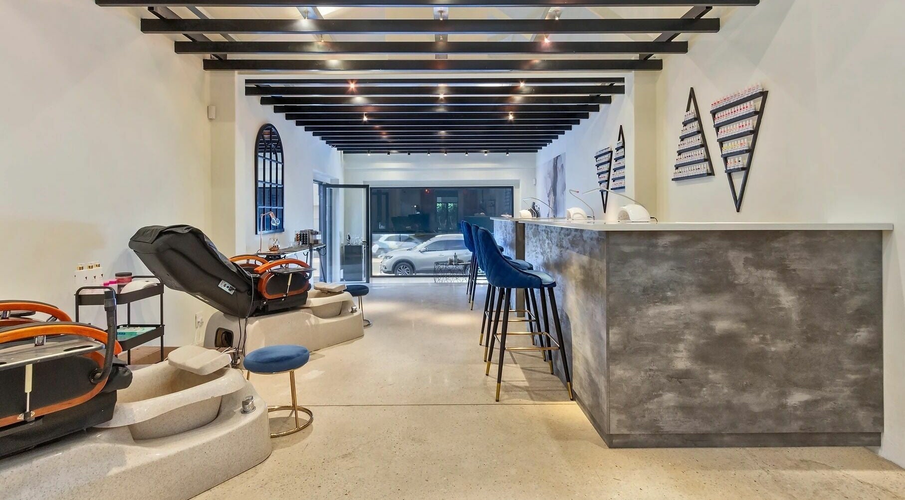 Modern interior at Shenanigans Beauty and Laser Clinic - Claremont, Cape Town, Western Cape, ZA, featuring sleek seating.