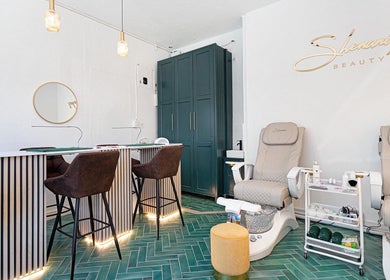 Elegant interior of Shenanigans Beauty and Laser Clinic - Sea Point, Cape Town, offering luxurious wellness services.