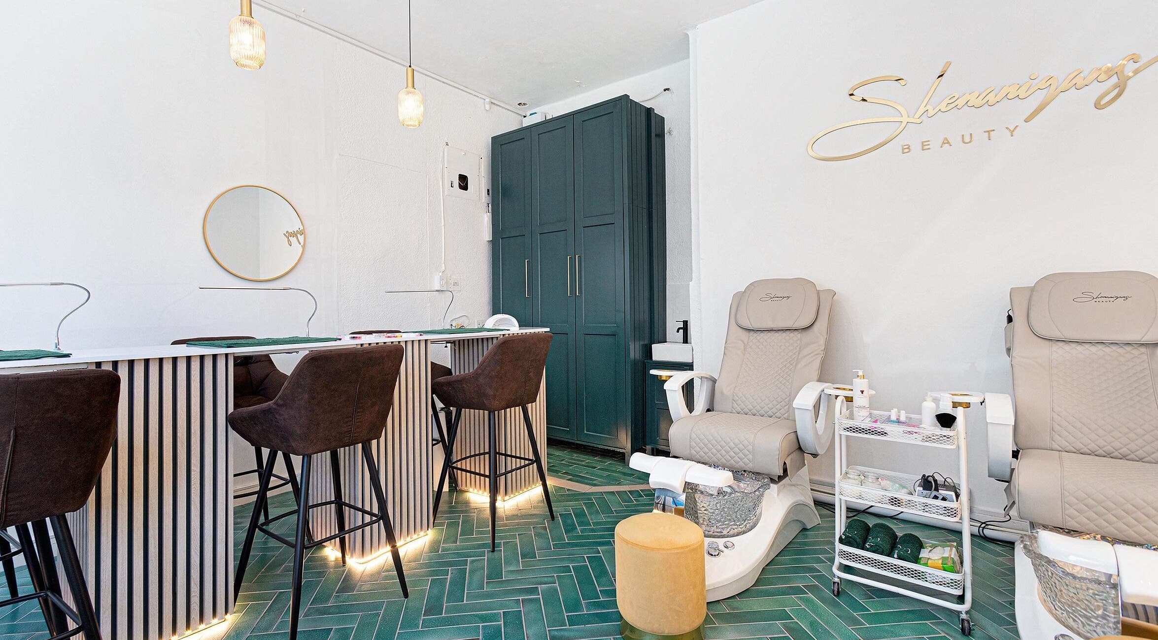 Elegant interior of Shenanigans Beauty and Laser Clinic - Sea Point, Cape Town, offering luxurious wellness services.