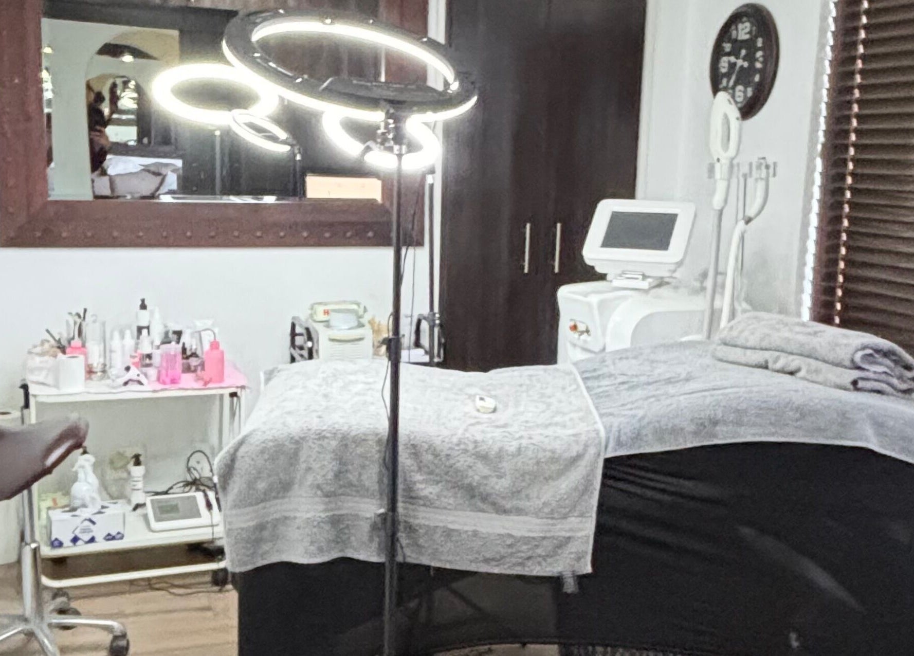 A serene treatment room at NDI Aesthetics, PMU, Laser and Lash Beauty Salon, Cape Town, Western Cape, ZA.