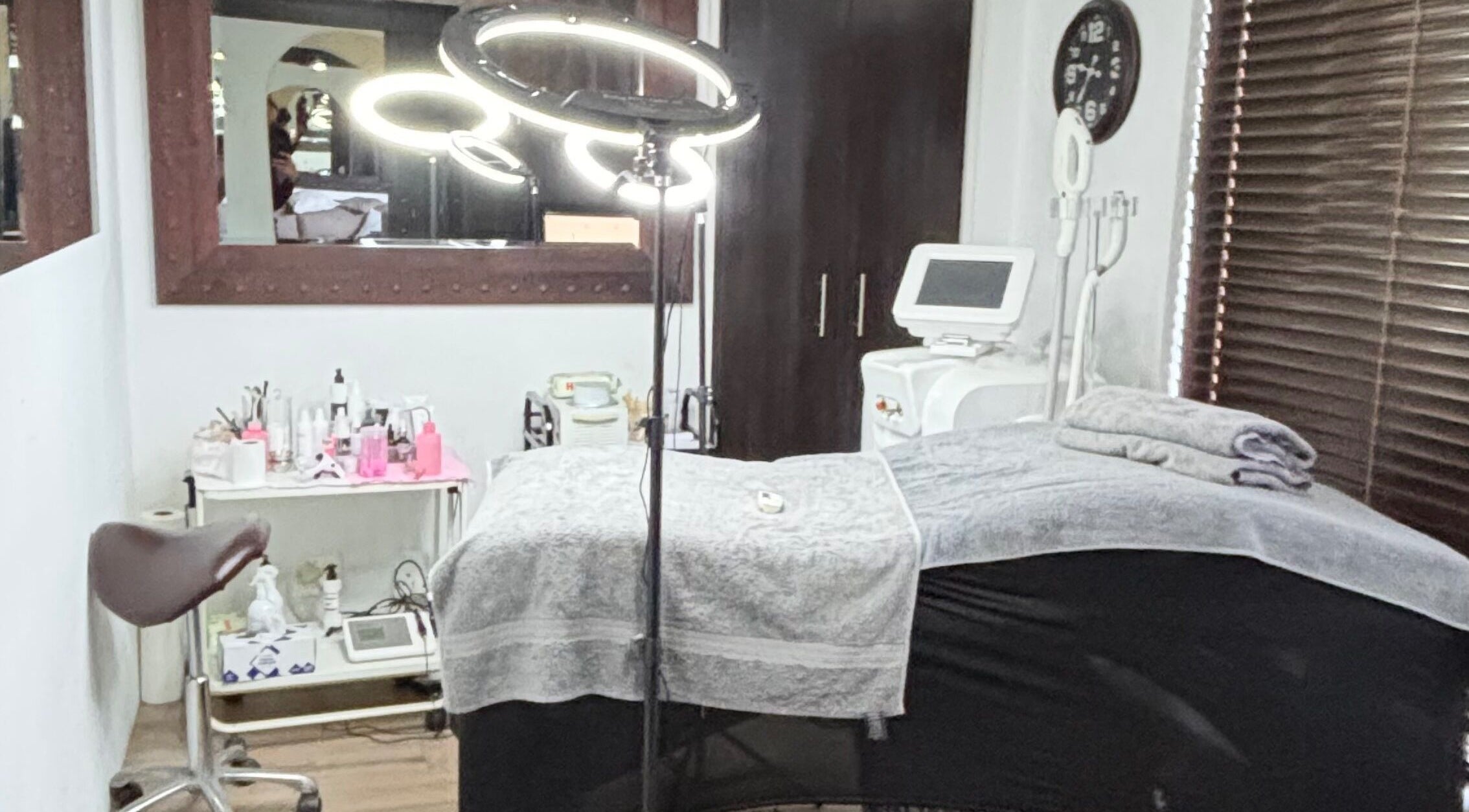A serene treatment room at NDI Aesthetics, PMU, Laser and Lash Beauty Salon, Cape Town, Western Cape, ZA.