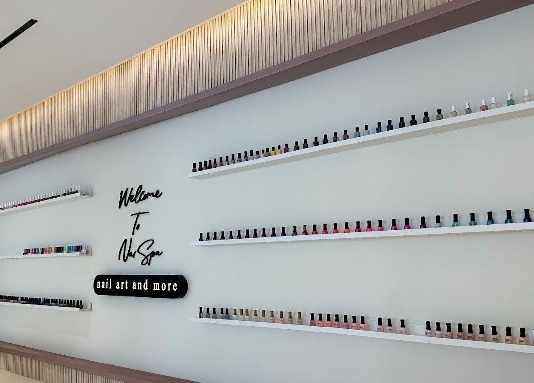 Colorful nail polish display at Nai Spa, Riyadh, Riyadh Province, SA, showcasing nail art options.