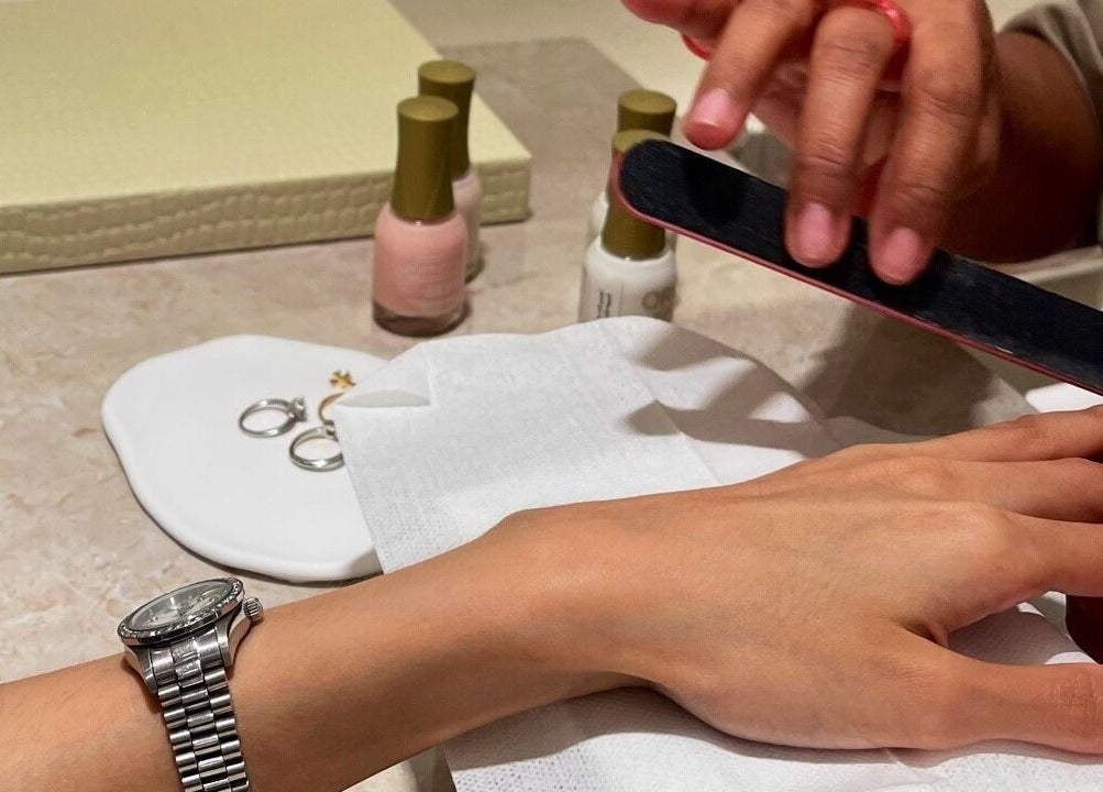 Manicure session at Nai Spa, Riyadh, Riyadh Province, SA, showcasing detailed nail care.