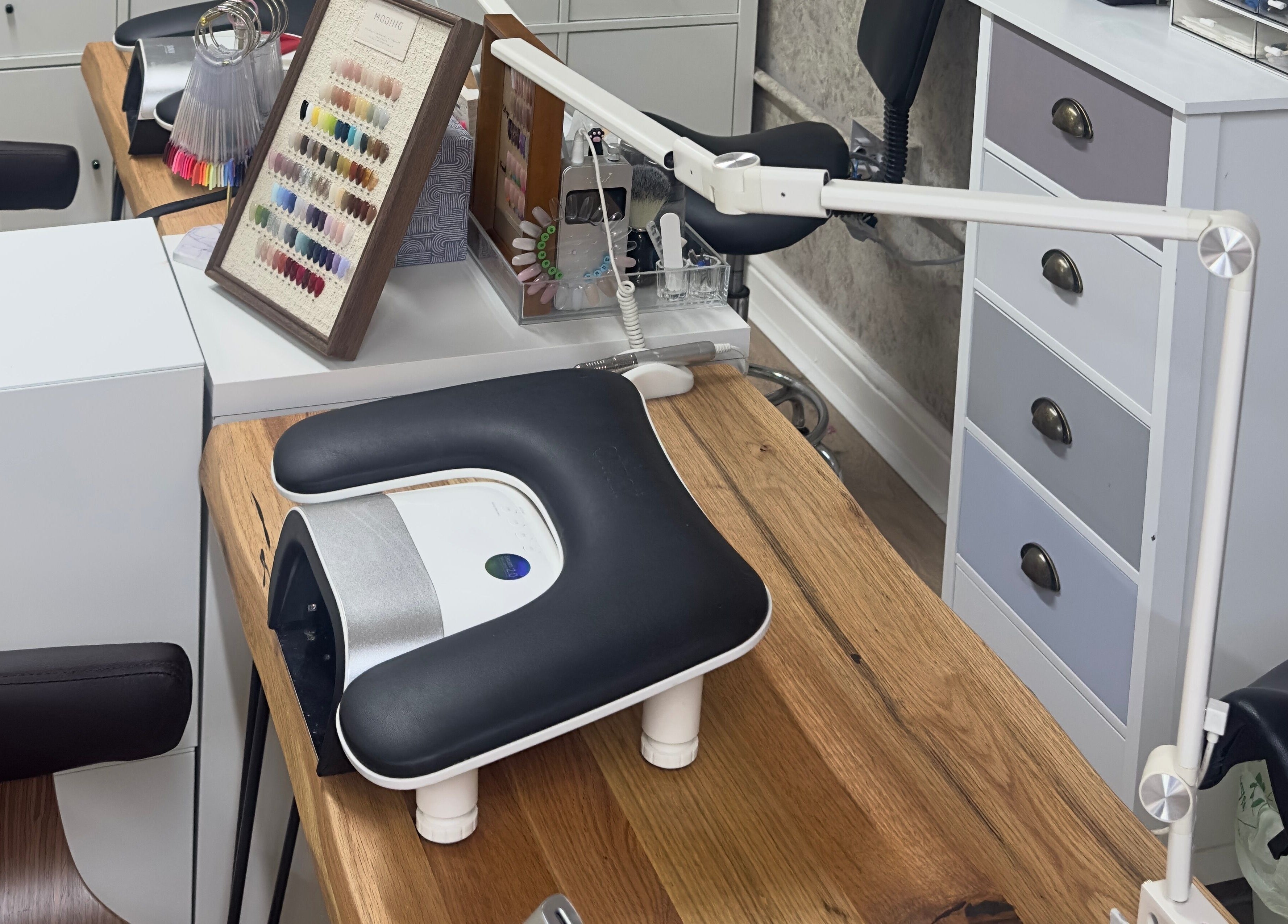 Sophisticated nail station at 真Jin Salon, Warrington, England, GB with modern tools and elegant display.