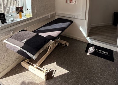 Cozy therapy room at Venture Physiotherapy in Leicester, England, GB, featuring a modern treatment bed.