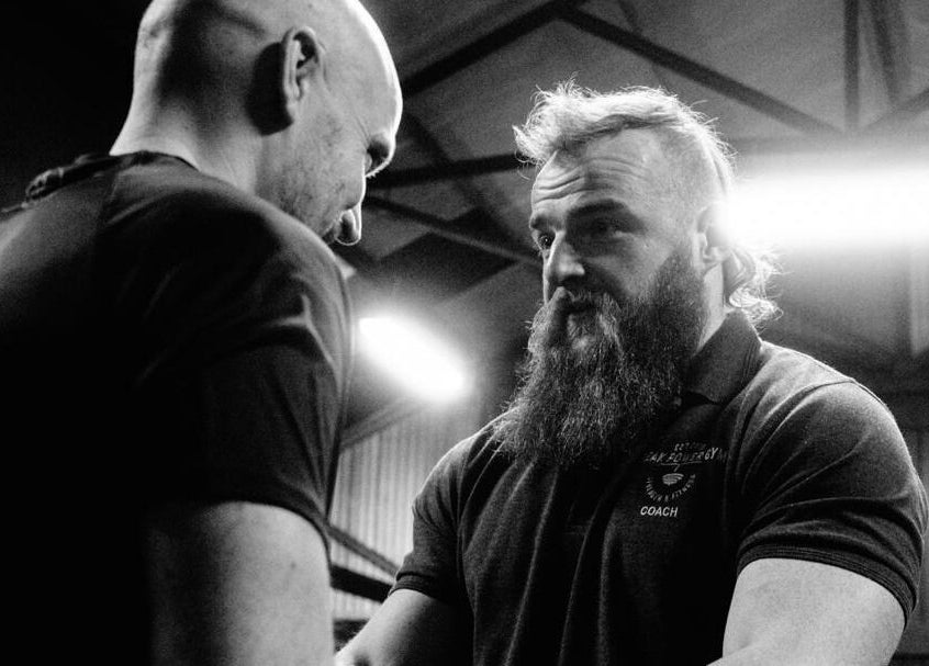 Trainer guides client at Aaron Wilman - Mastery of Movement, Whaley Bridge, England, GB.