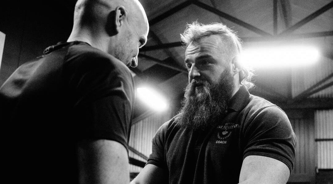 Trainer guides client at Aaron Wilman - Mastery of Movement, Whaley Bridge, England, GB.