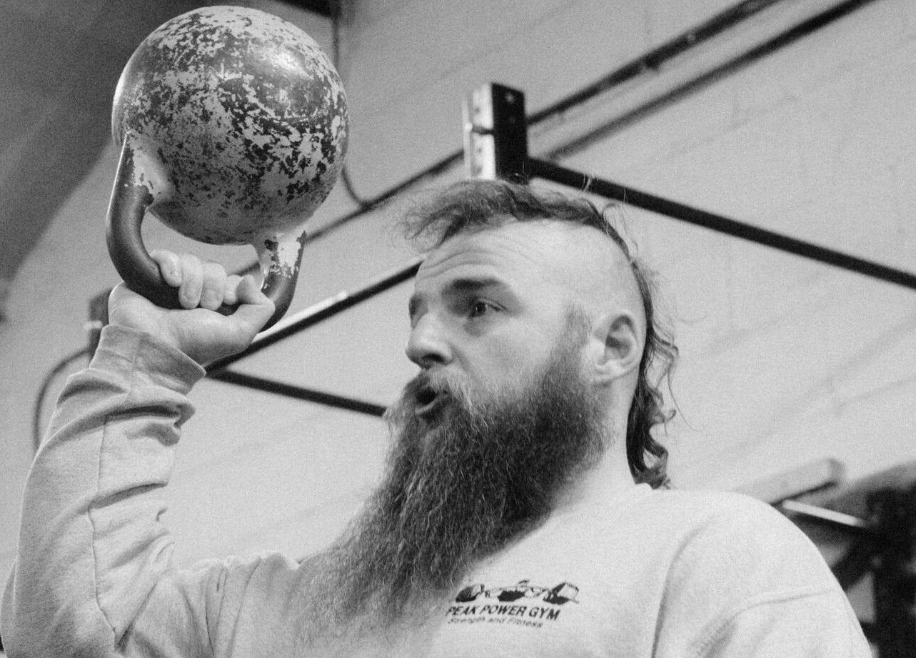 Person lifting kettlebell at Aaron Wilman - Mastery of Movement, Whaley Bridge, England, GB.