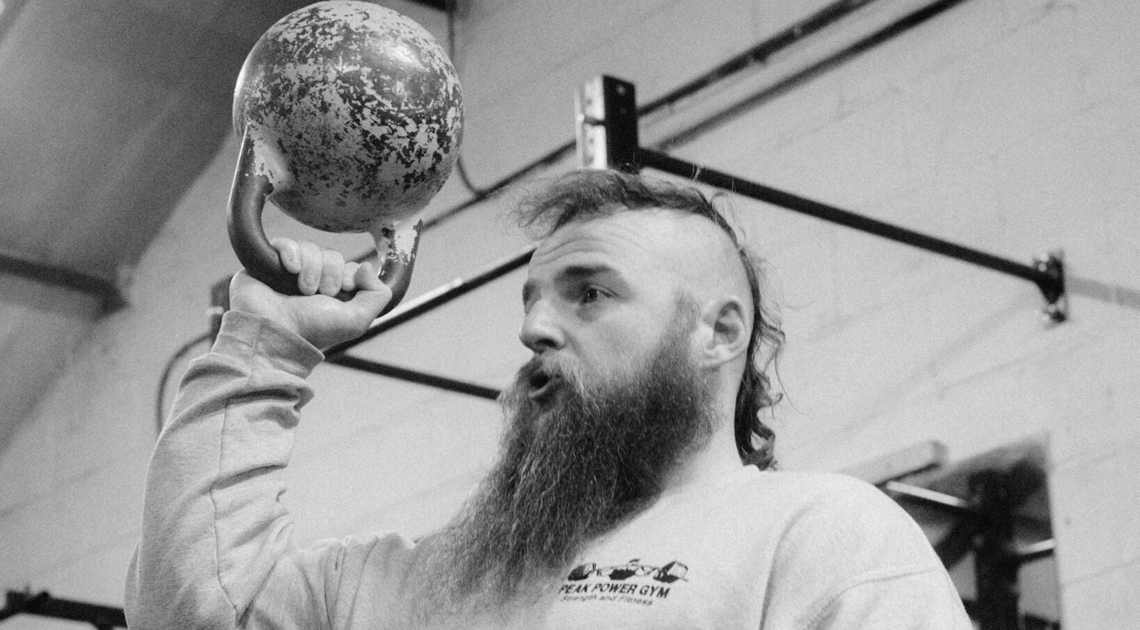 Person lifting kettlebell at Aaron Wilman - Mastery of Movement, Whaley Bridge, England, GB.