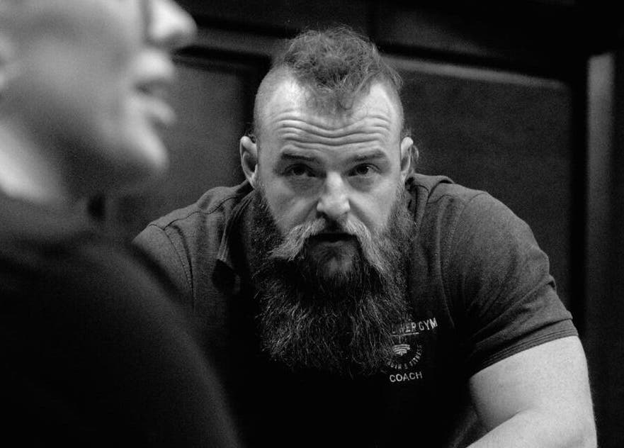 Coach at Aaron Wilman - Mastery of Movement, Whaley Bridge, England, GB, deeply focused during a session.