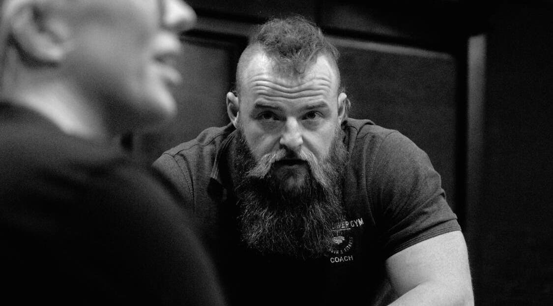 Coach at Aaron Wilman - Mastery of Movement, Whaley Bridge, England, GB, deeply focused during a session.