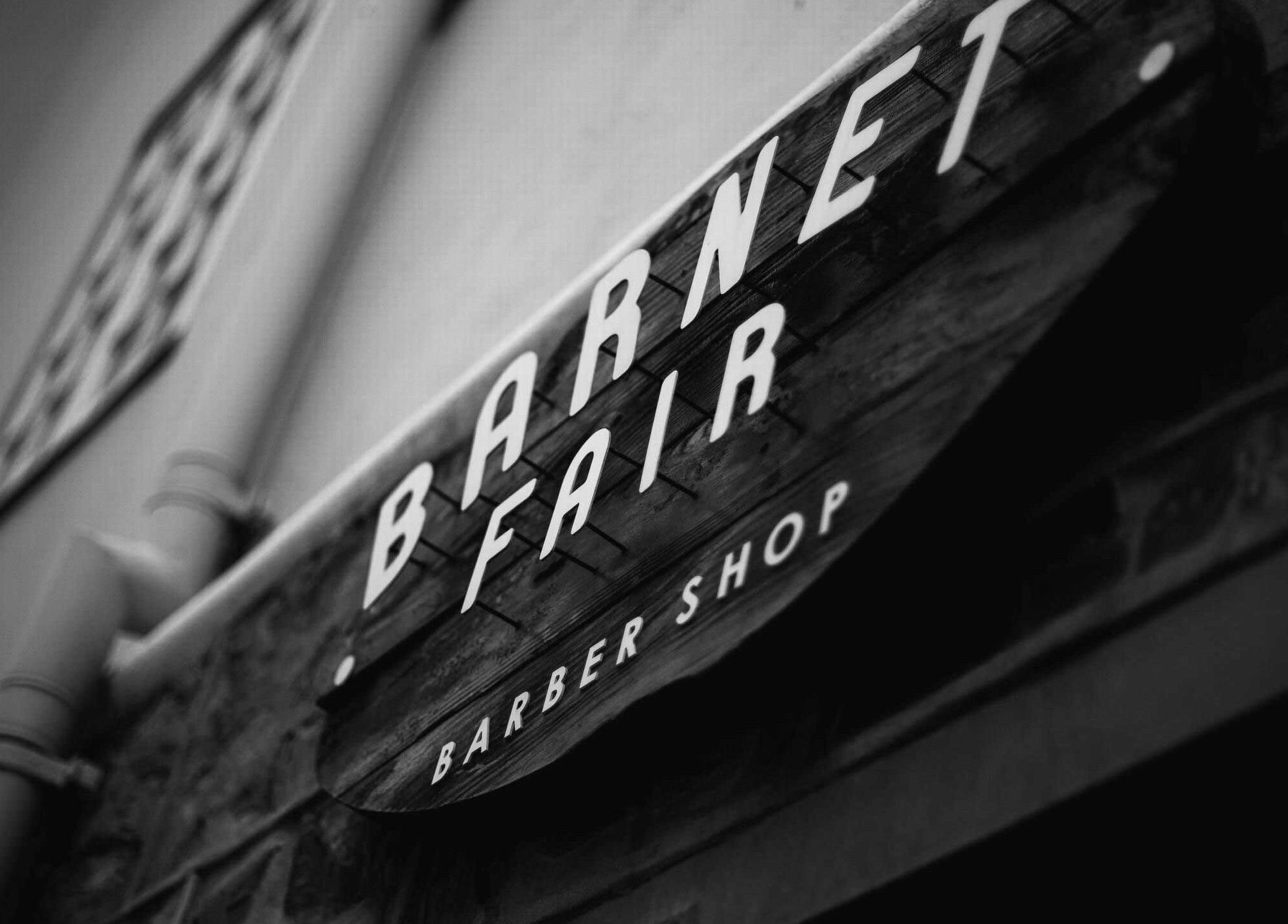 Barnet Fair Sea Point sign at Cape Town, Western Cape, ZA. Stylish barbershop facade.