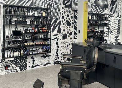 Modern salon interior at Barnet Fair Bree Street, Cape Town, Western Cape, ZA with stylish decor and seating.