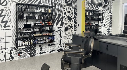 Modern salon interior at Barnet Fair Bree Street, Cape Town, Western Cape, ZA with stylish decor and seating.