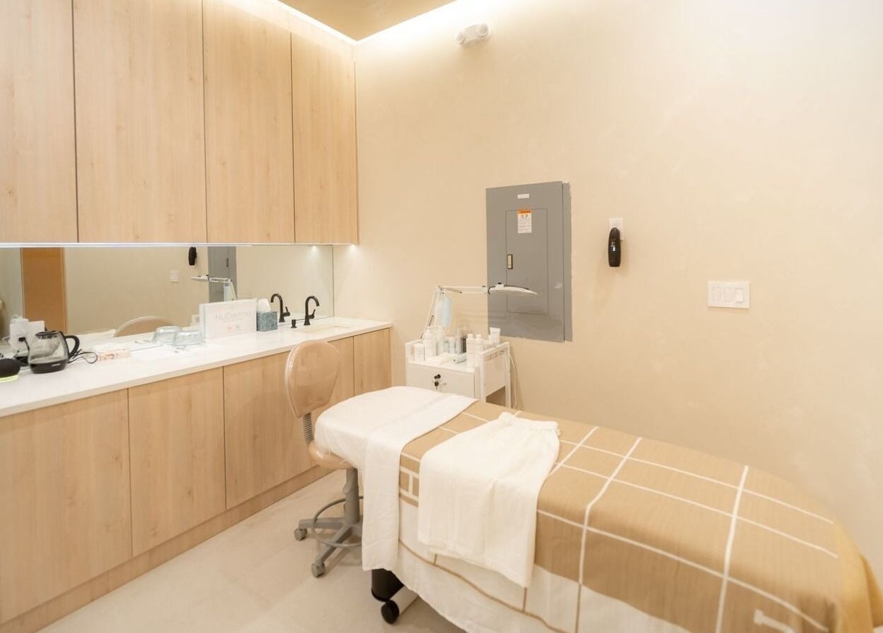 Peaceful treatment room at Brows and Brows in Hallandale Beach, Florida, US, featuring a massage table.