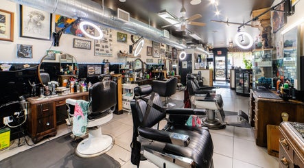 Interior of Cut N Run Barbershop in Toronto, Ontario, CA featuring sleek barber chairs and stylish decor.