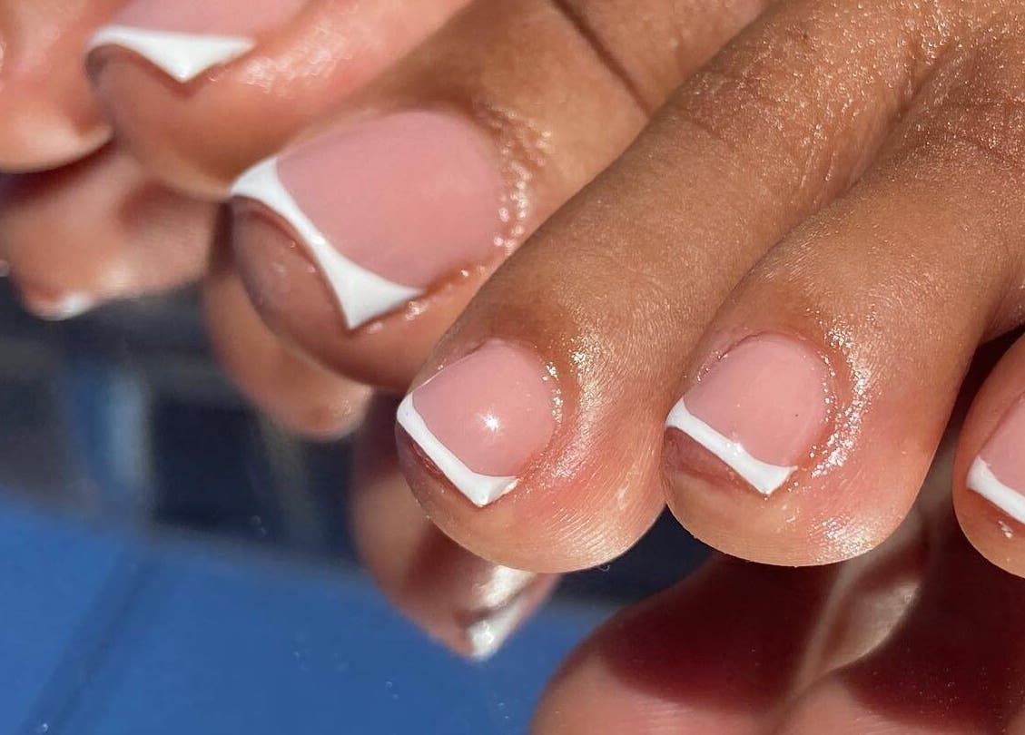 French pedicure at Kshine Aesthetics, Brievengat, Curaçao, CW showcasing glossy, perfectly styled nails.