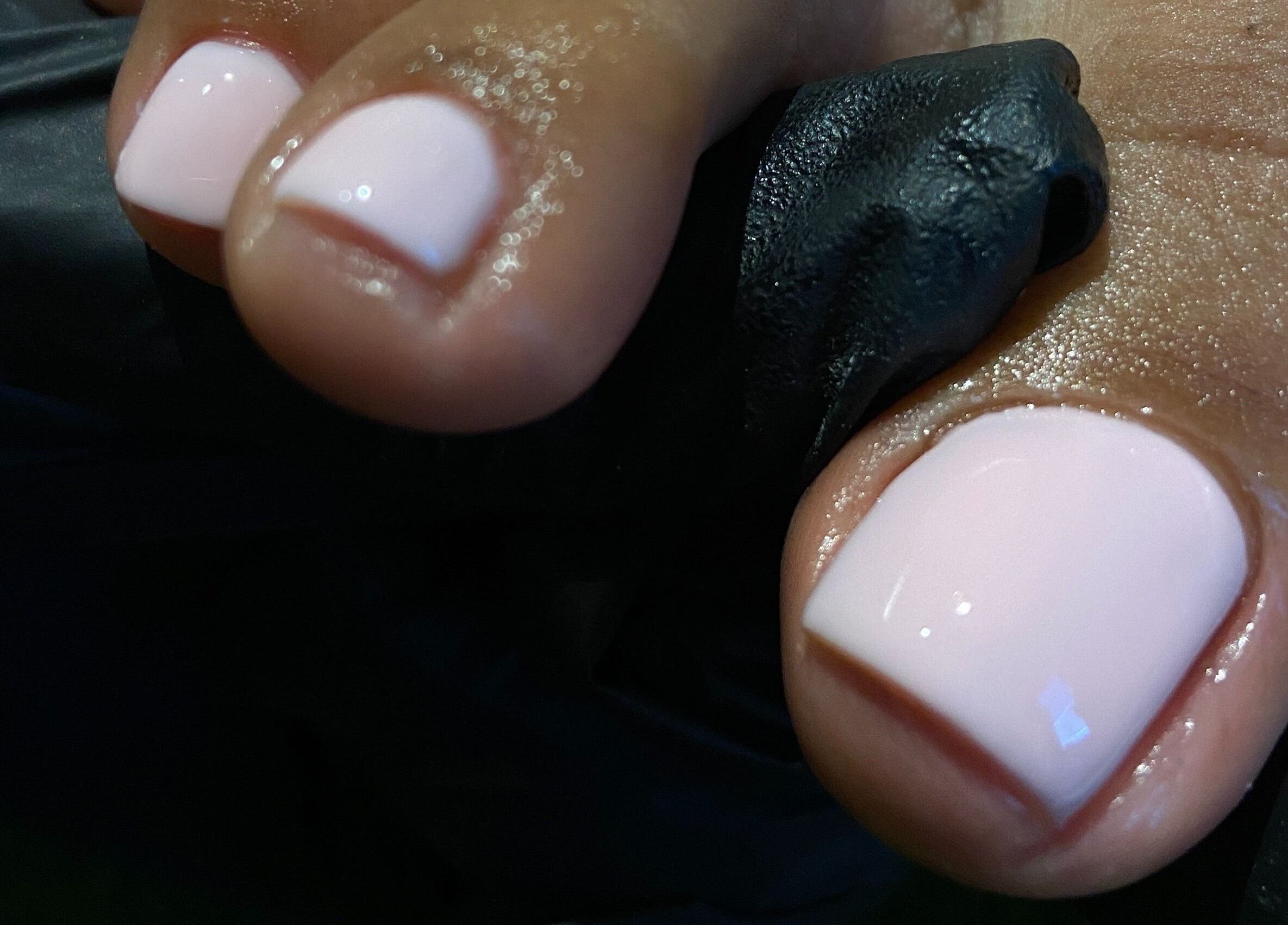 Close-up of elegant pink nails at Kshine Aesthetics, Brievengat, Curaçao, CW.