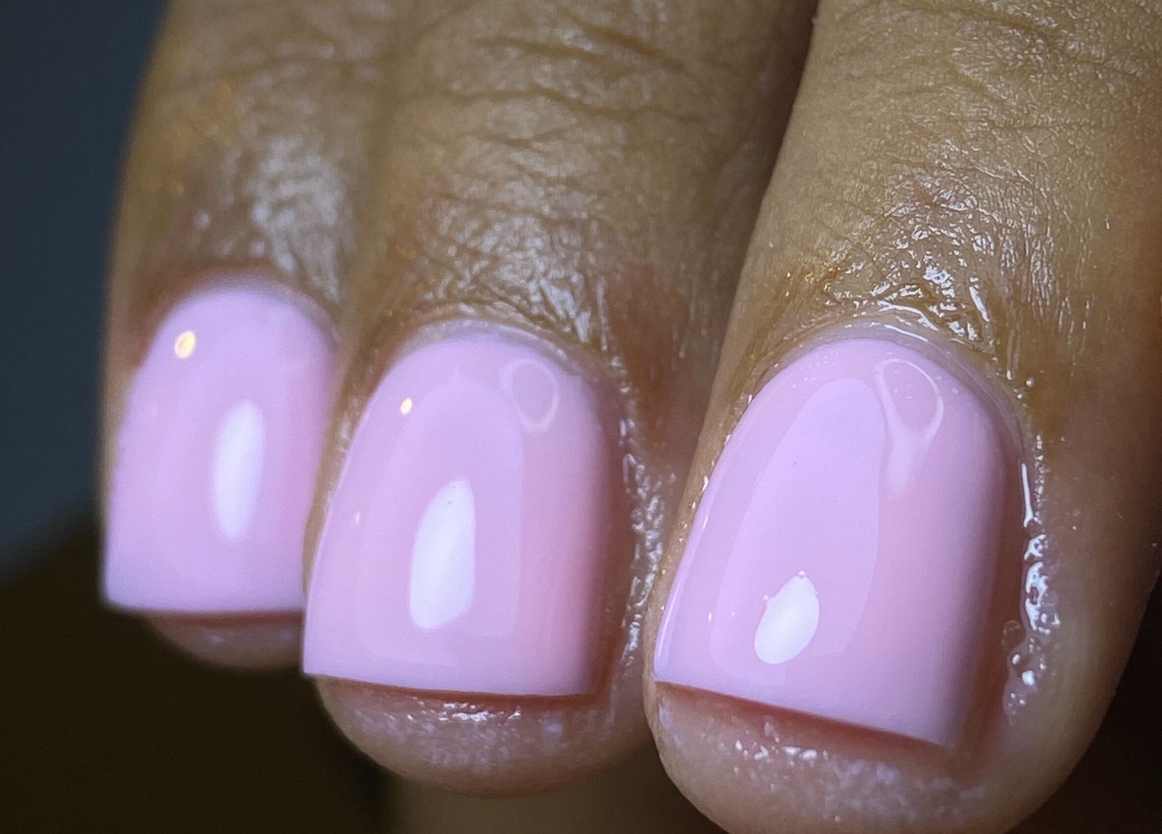 Elegant pink manicure at Kshine Aesthetics, Brievengat, Curaçao, CW, showcasing professional nail care.