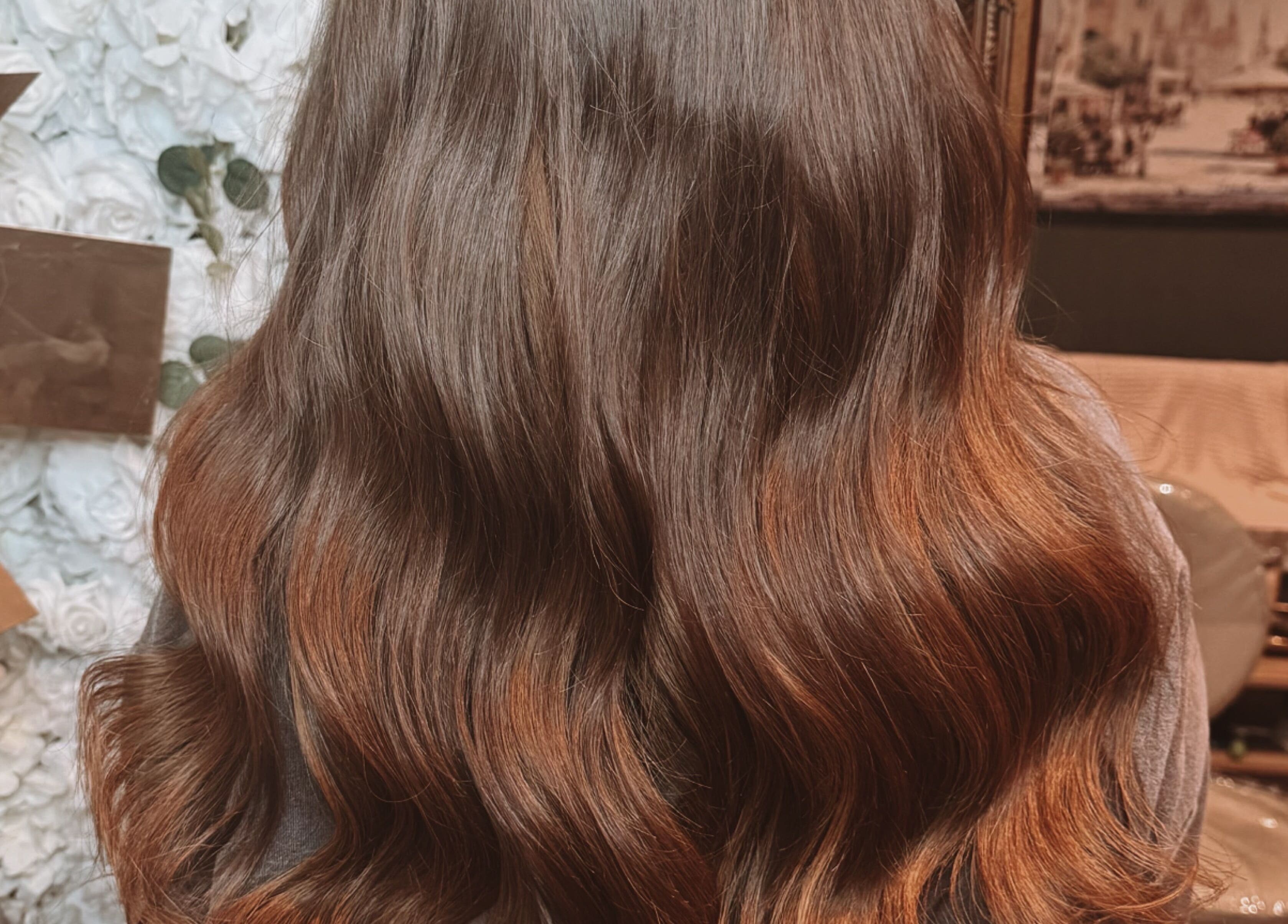 Lustrous wavy hair styled at Hair Extensions by Kinga Liu in Leeds, England, GB.