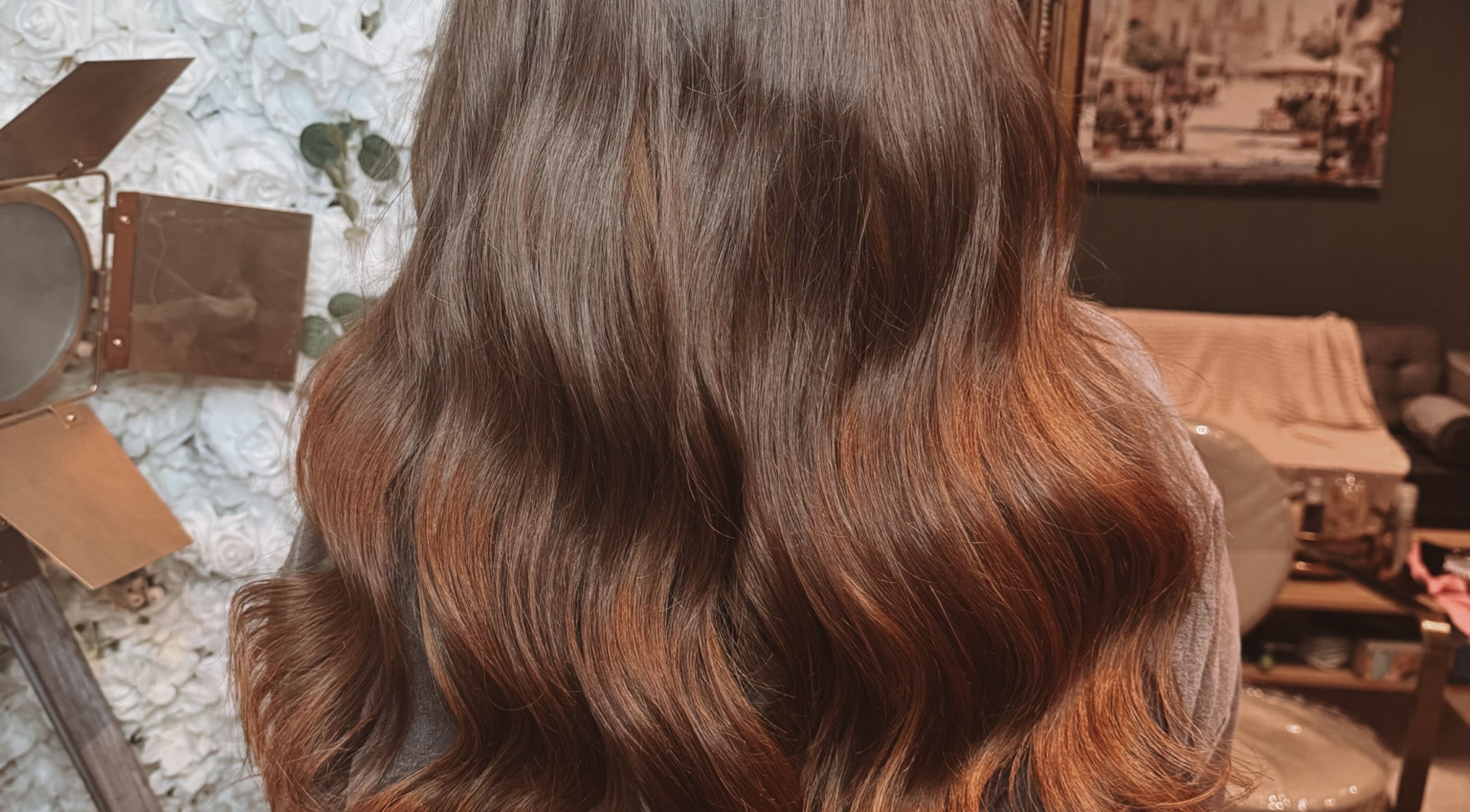 Lustrous wavy hair styled at Hair Extensions by Kinga Liu in Leeds, England, GB.