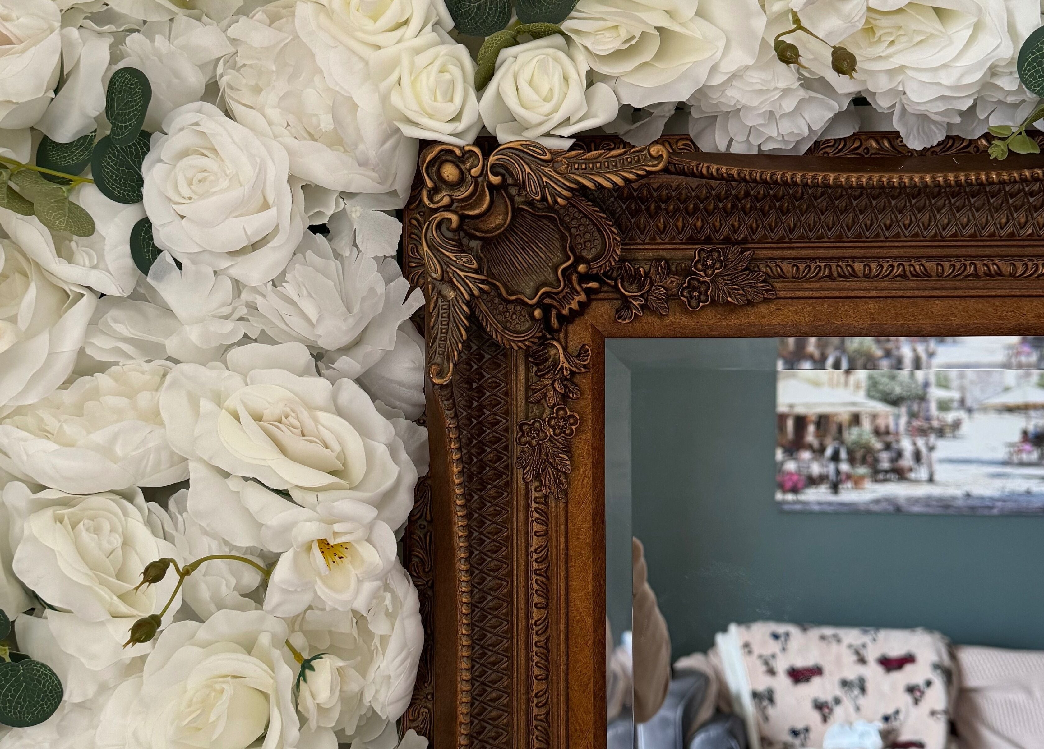 Elegant floral arrangement and ornate mirror at Hair Extensions by Kinga Liu in Leeds, England, GB.