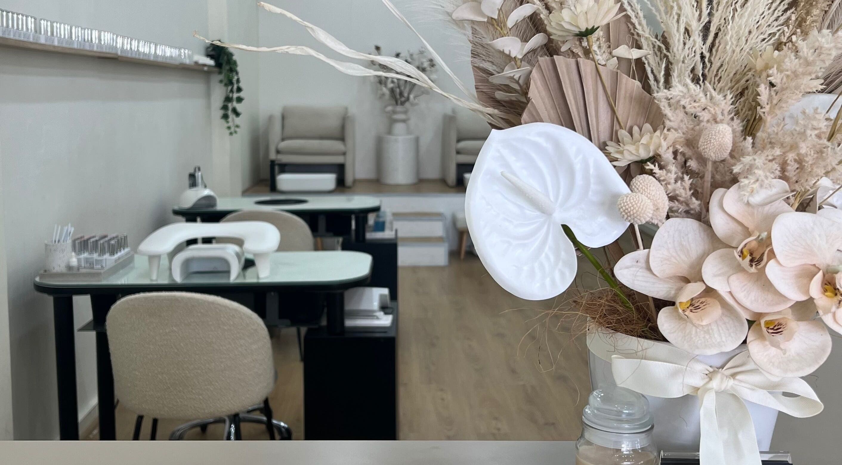 Elegant nail service area with chic floral decor at Larissa Nails & Beauty, Griffith, New South Wales, AU.
