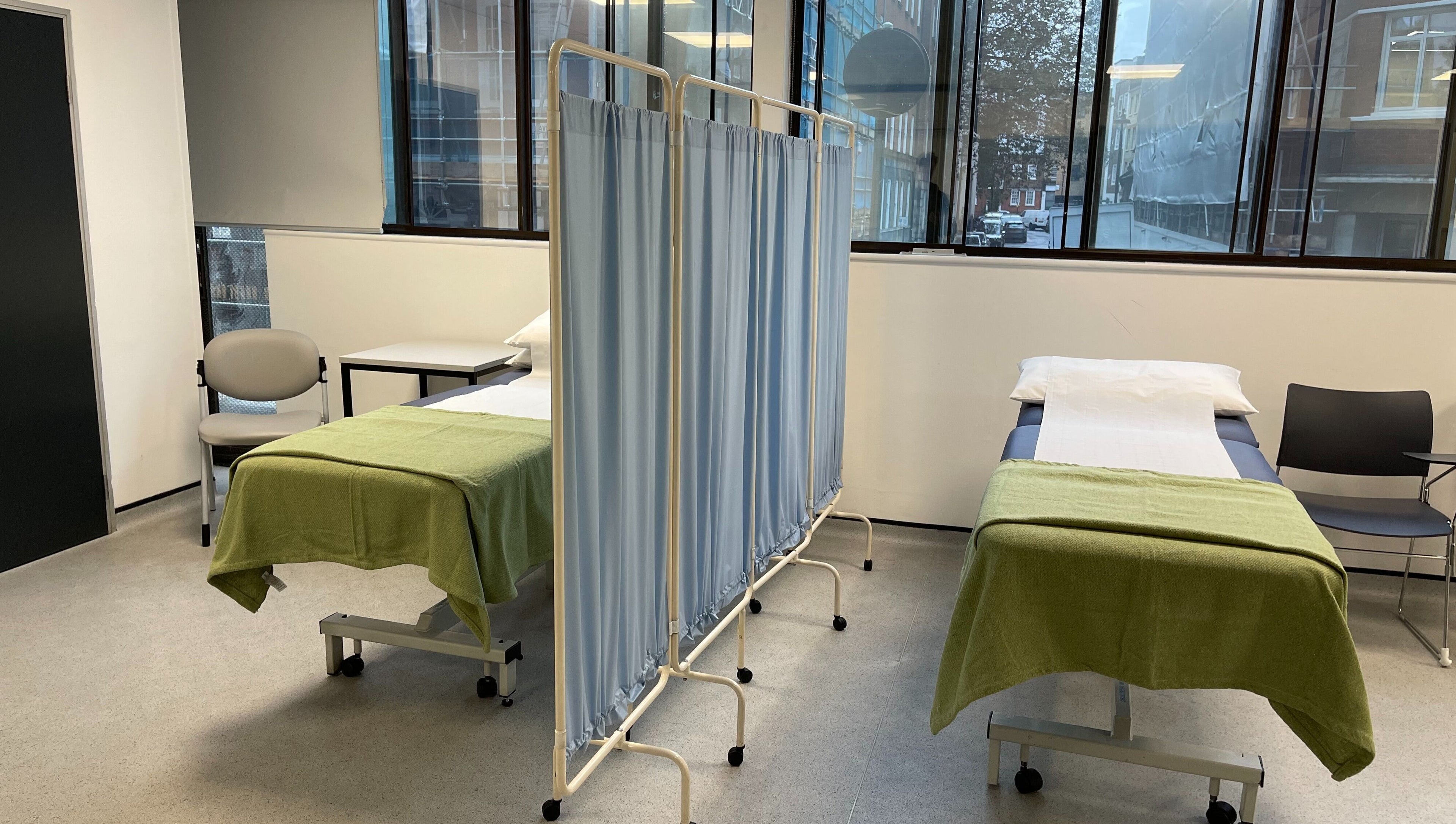 Calm and inviting multibed setup at CALM Community Acupuncture London Multibed Clinic, London, England, GB.