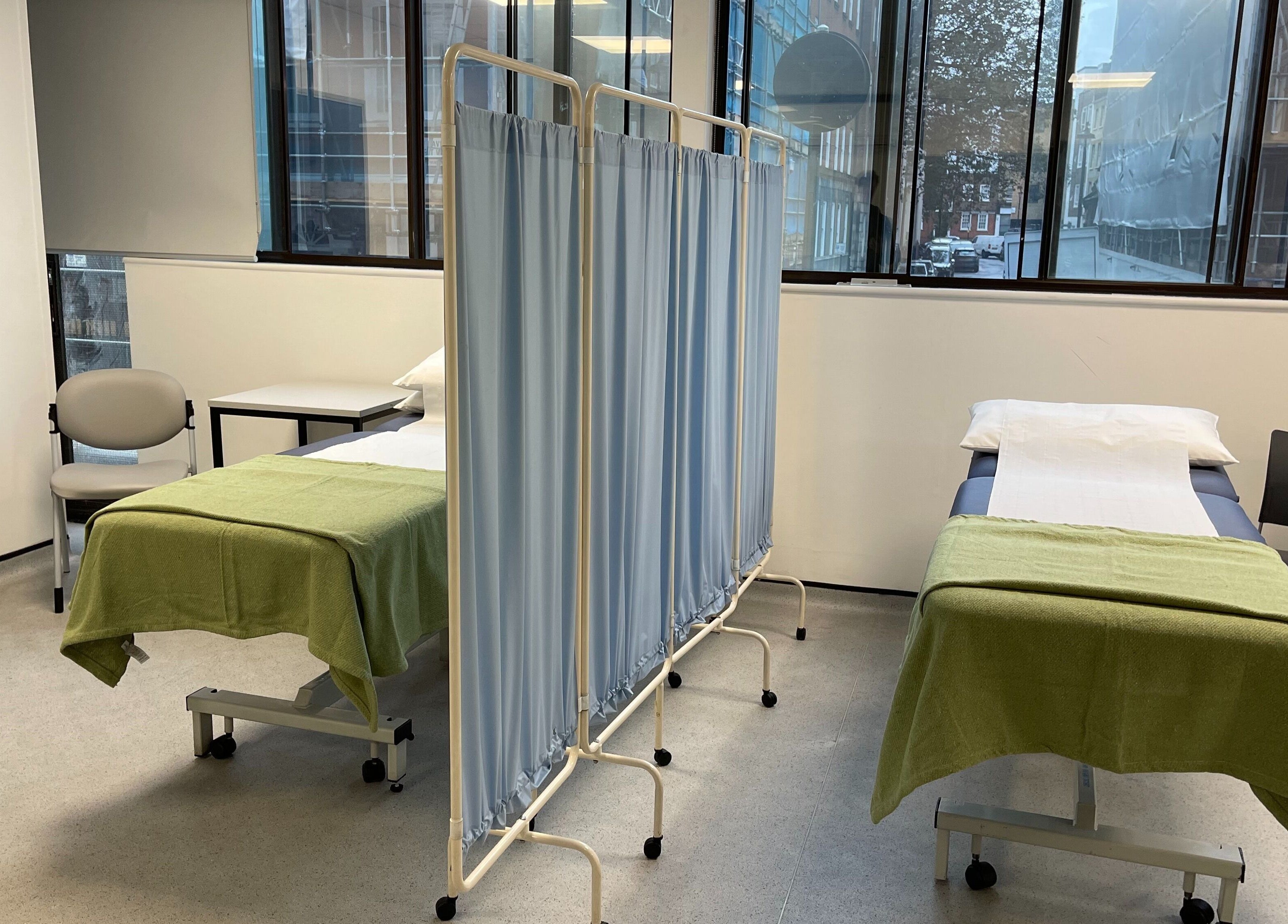 Calm and inviting multibed setup at CALM Community Acupuncture London Multibed Clinic, London, England, GB.