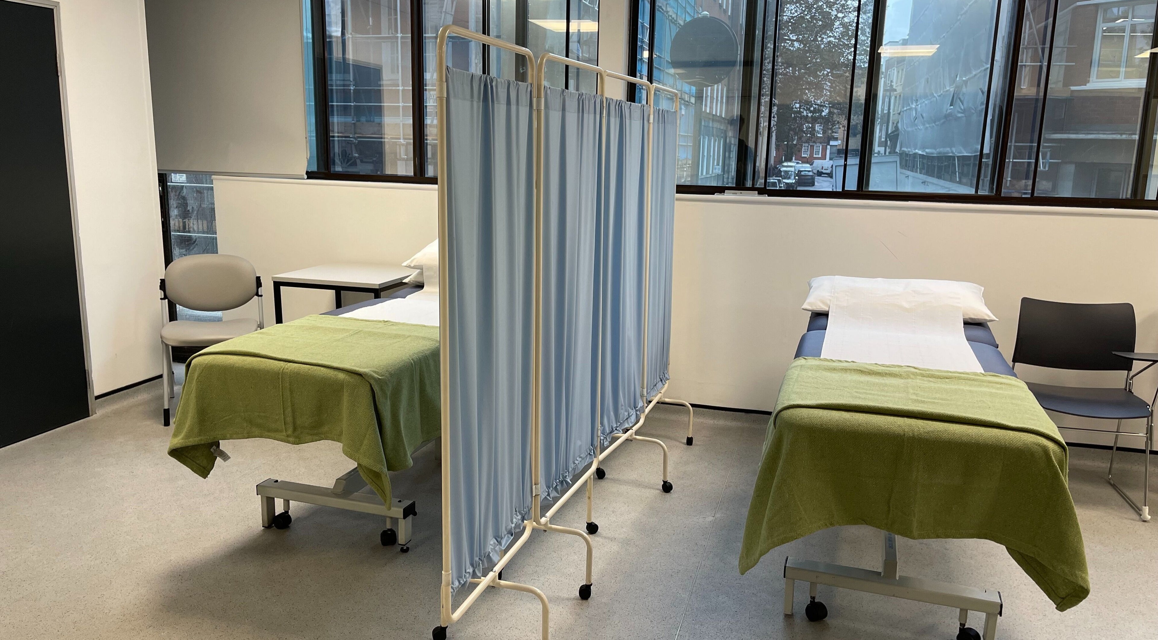 Calm and inviting multibed setup at CALM Community Acupuncture London Multibed Clinic, London, England, GB.
